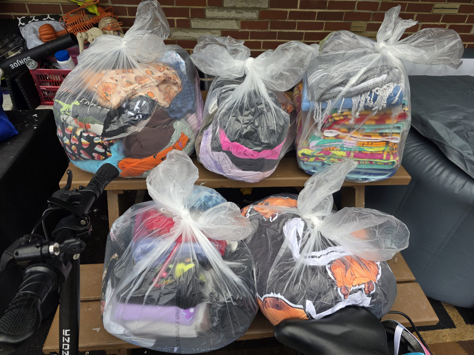 Freshly washed, folded, and bagged laundry ready for delivery
